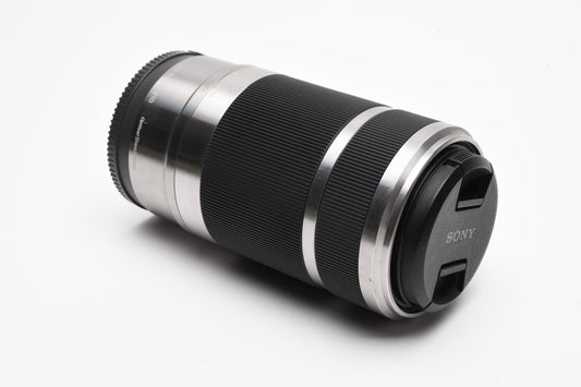 Sony 55-210mm f4.5-6.3 OSS zoom lens (Silver) w/Lens caps, Good!