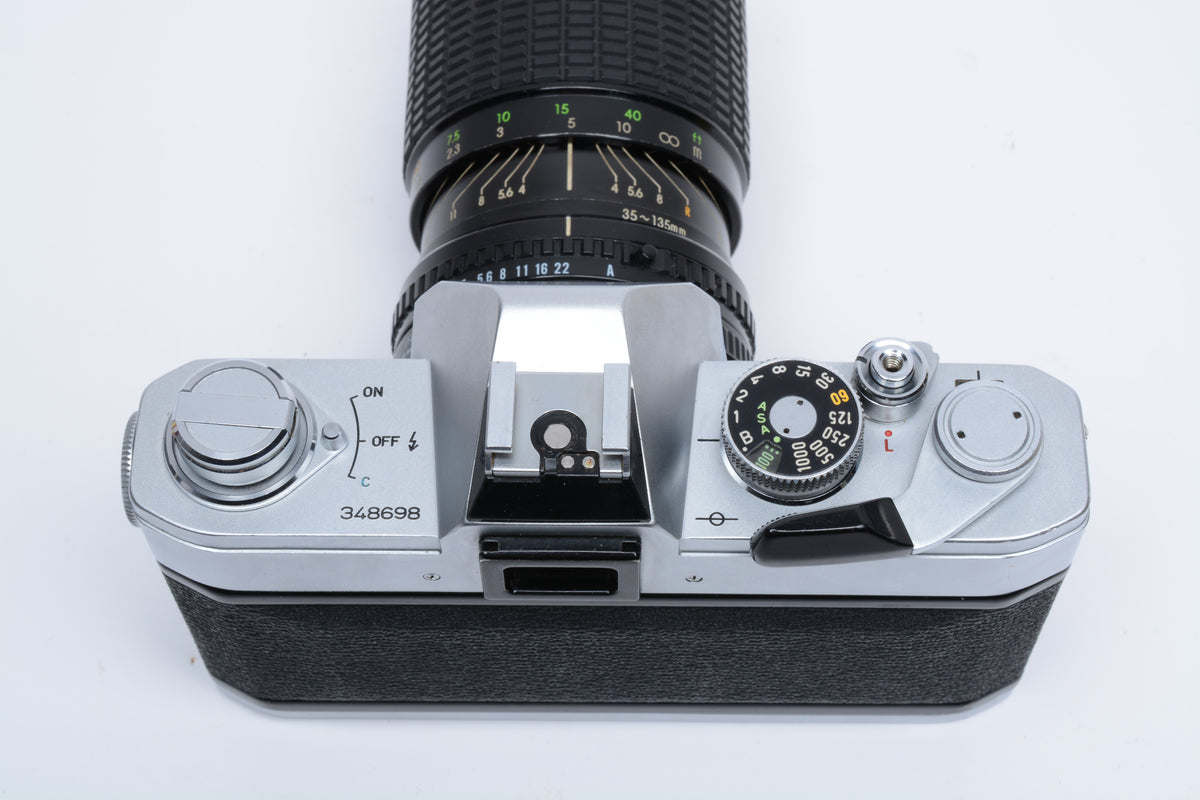 Canon FTb QL 35mm SLR w/Sigma 35-135mm f3.5-4.5 Zoom, Manual, New seals, Good