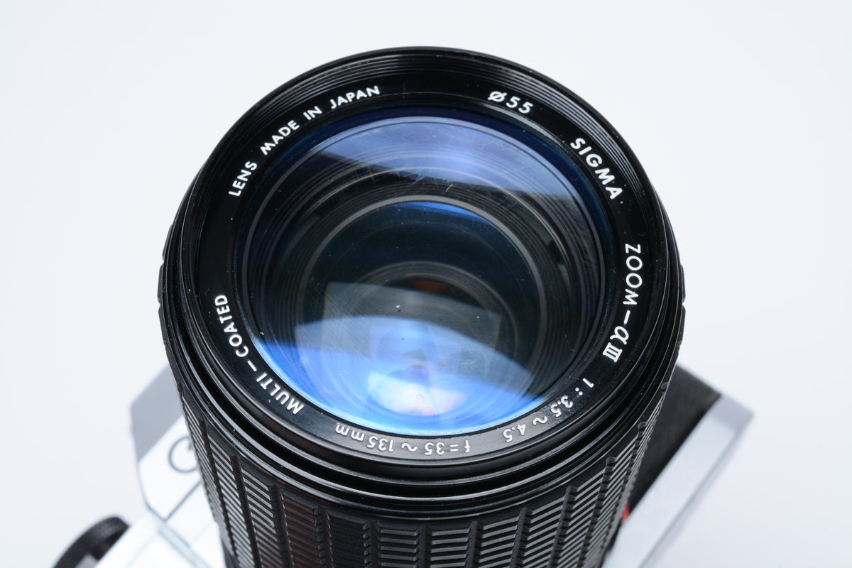 Canon FTb QL 35mm SLR w/Sigma 35-135mm f3.5-4.5 Zoom, Manual, New seals, Good