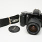 Canon EOS Rebel XS 35mm SLR, w/EF 28-90mm F4-5.6 III zoom, strap, cap, UV