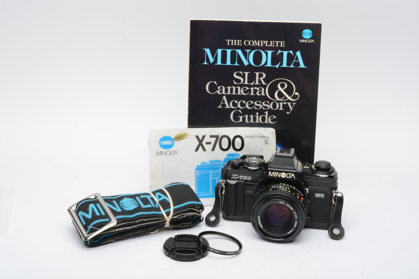 Minolta X700 35mm SLR w/50mm f1.7 lens, strap, UV, new seals, Book, Nice!