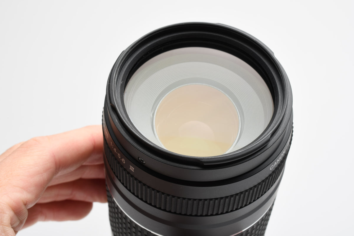 Canon EF 75-300mm f4-5.6 III Telephoto zoom lens w/ caps, UV, Hood, Nice!