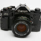 Canon A-1 35mm SLR w/50mm F1.8 FD lens, grip, strap, new seals, Nice!