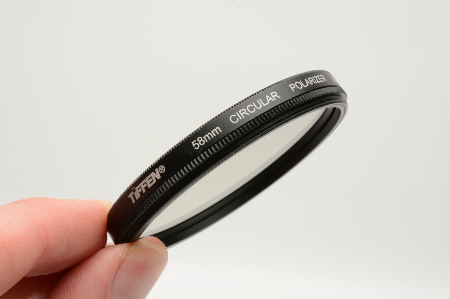 Tiffen 58mm circular polarizing filter in jewel case, Clean