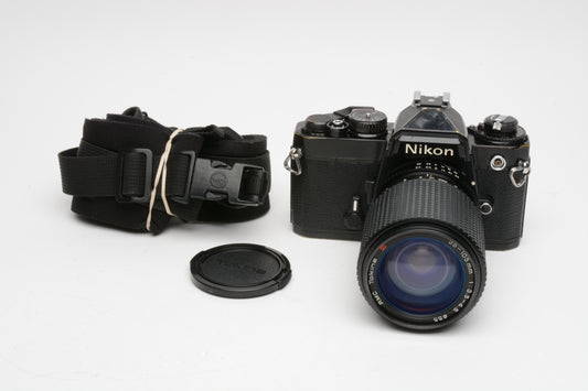 Nikon FE Black 35mm SLR w/Tokina RMC 35-105mm f3.5-4.5, cap+strap, new seals