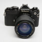 Nikon FE Black 35mm SLR w/Tokina RMC 35-105mm f3.5-4.5, cap+strap, new seals