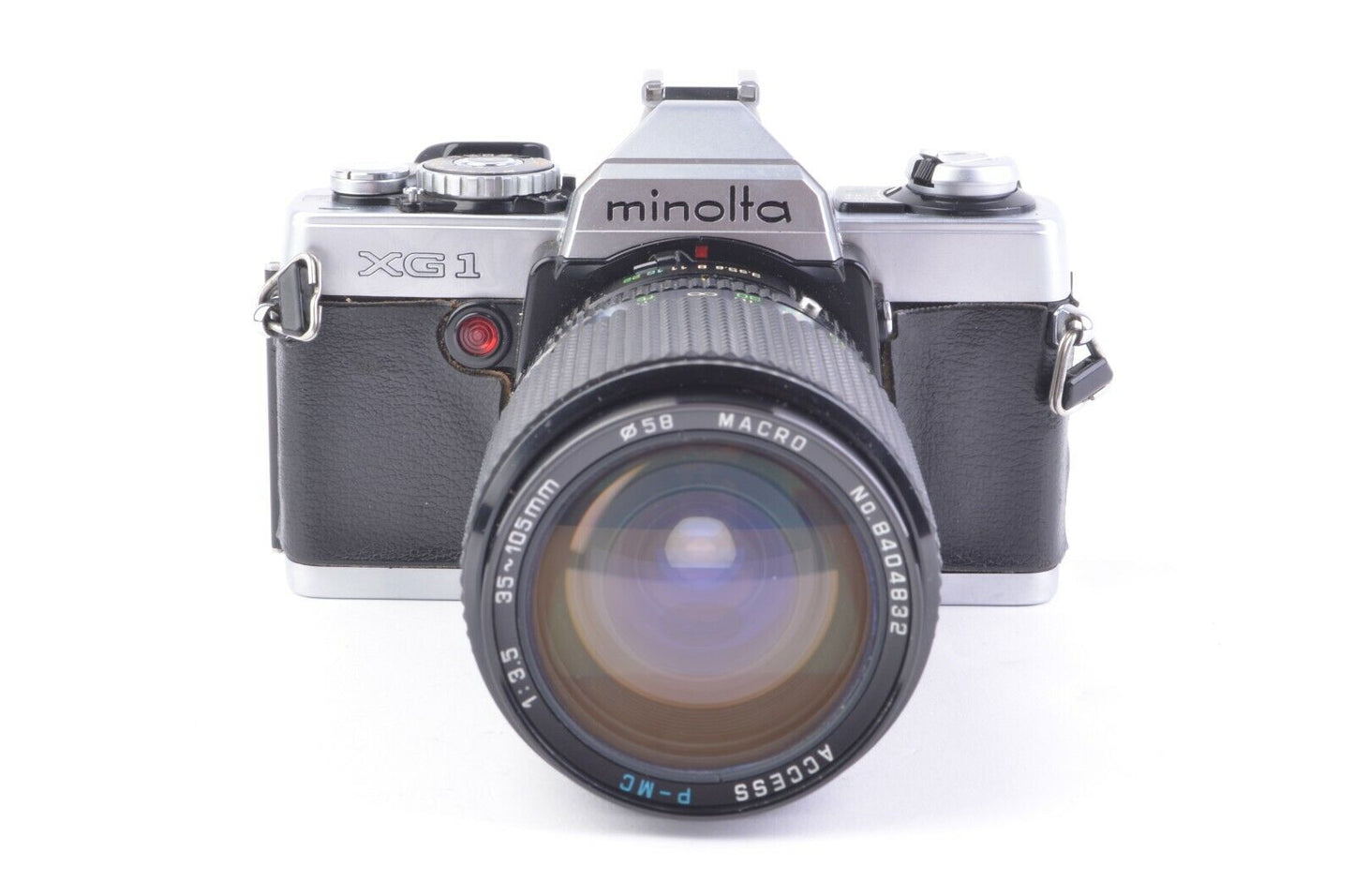 Minolta XG-1 35mm SLR w/35-105mm zoom, flash, hood, case, Tested, Great!