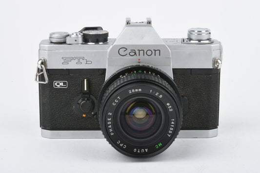 Canon FTb QL 35mm SLR w/28mm F2.8 wide lens, strap, cap, new seals