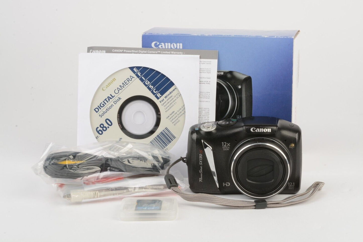 Canon SX130 IS 12.1MP Digital Camera, Cables, Strap, Manuals, Nice