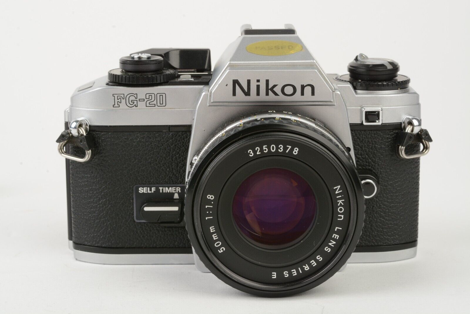 EXC+++ NIKON FG-20 35mm SLR BODY w/50MM f1.8 E, STRAP, NEW SEALS