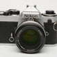 Nikon FE 35mm SLR w/Nikkor 50mm F1.8 prime lens, case, release, strap, tested