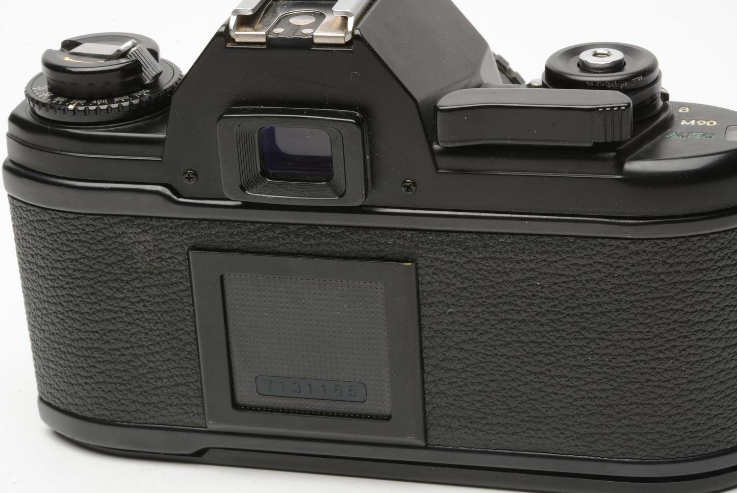 Nikon EM 35mm SLR w/Nikon Series E 50mm f1.8 lens, strap, cap, manual, new seals