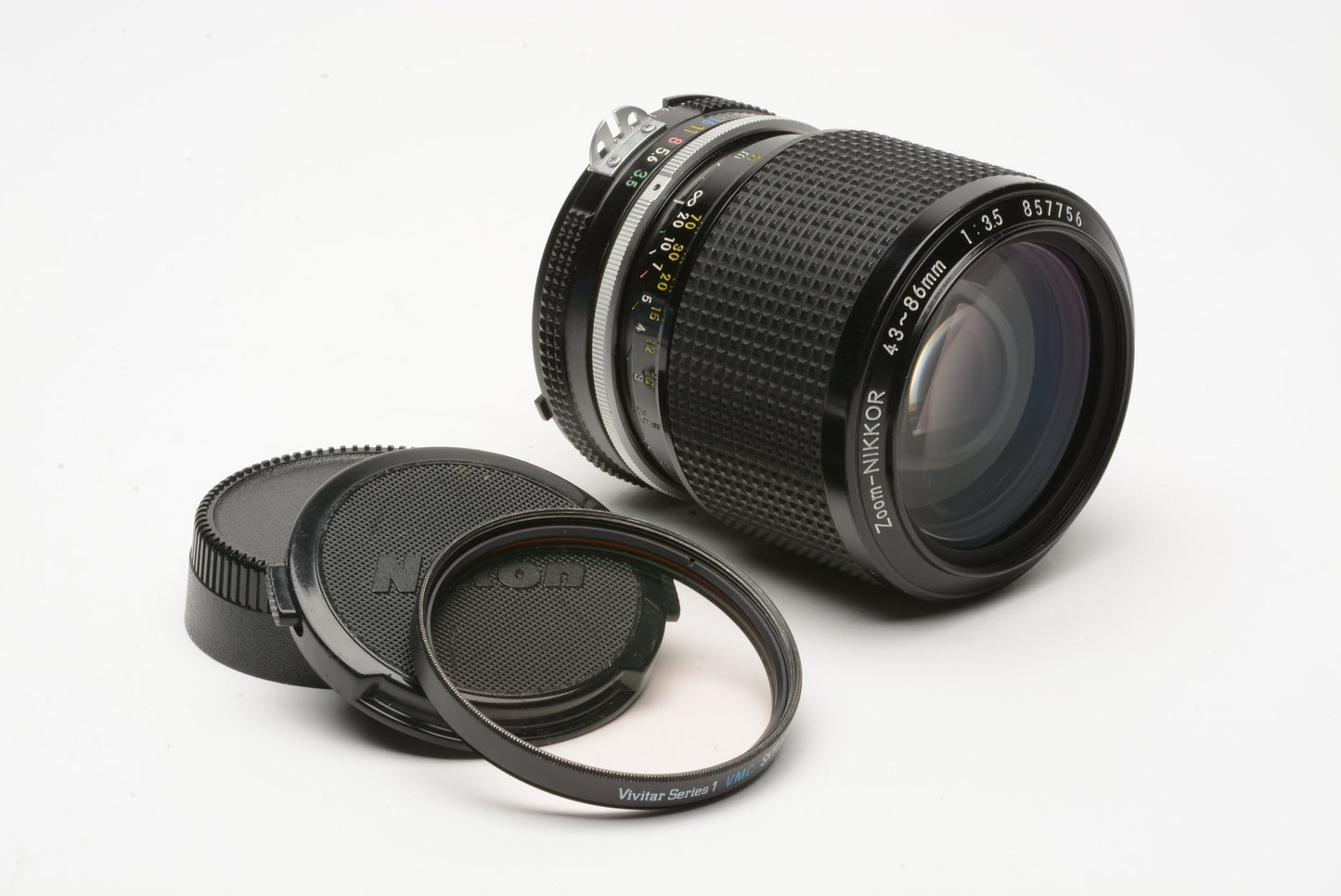 Nikon Nikkor 43-86mm f3.5 zoom lens, Nikon AI mount, caps + Skylight filter